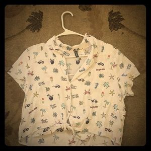 This is a fun and loud see through beach shirt